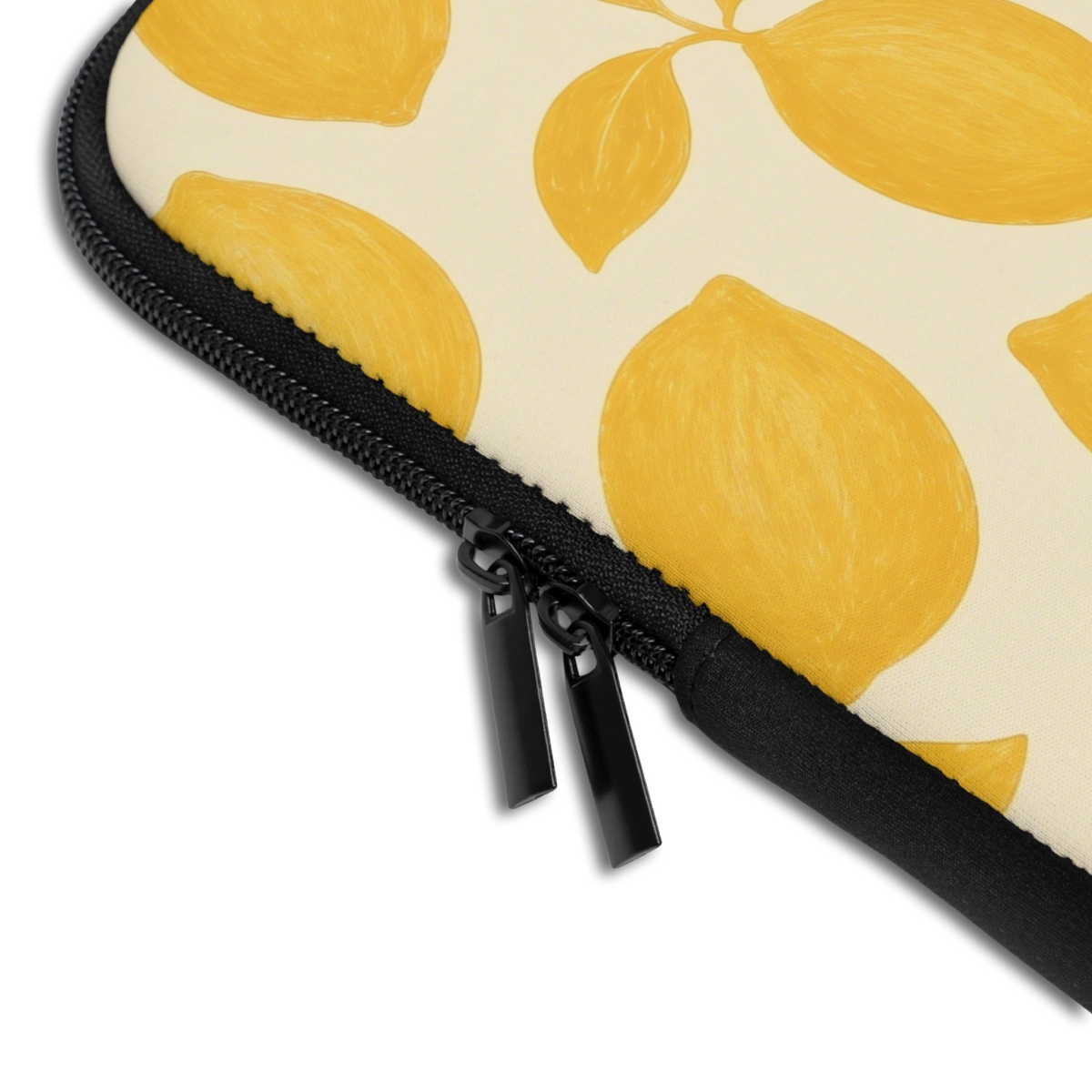 Close-up of the Personalized Amalfi Lemons Laptop Sleeve sleeve corner showing the printed design, the padded edge and the dual zipper pulls