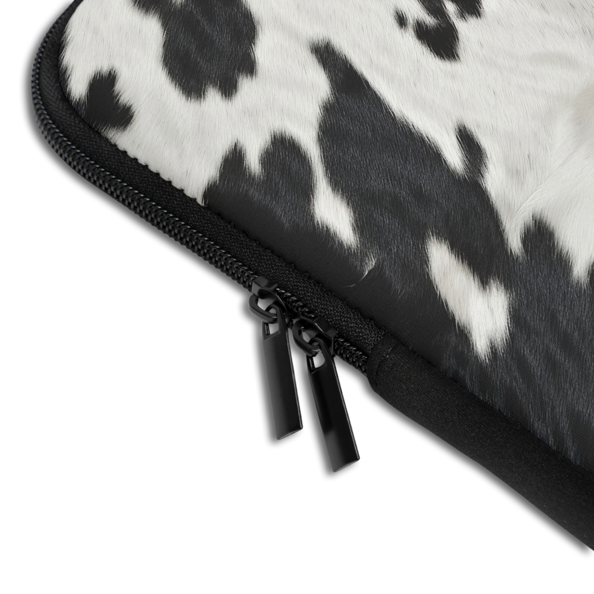 Close-up of the Personalized Cowhide Laptop Sleeve sleeve corner showing the printed design, the padded edge and the dual zipper pulls