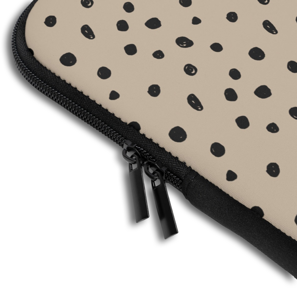 Close-up of the Spotted Dots Custom Name Laptop Sleeve sleeve corner showing the printed design, the padded edge and the dual zipper pulls