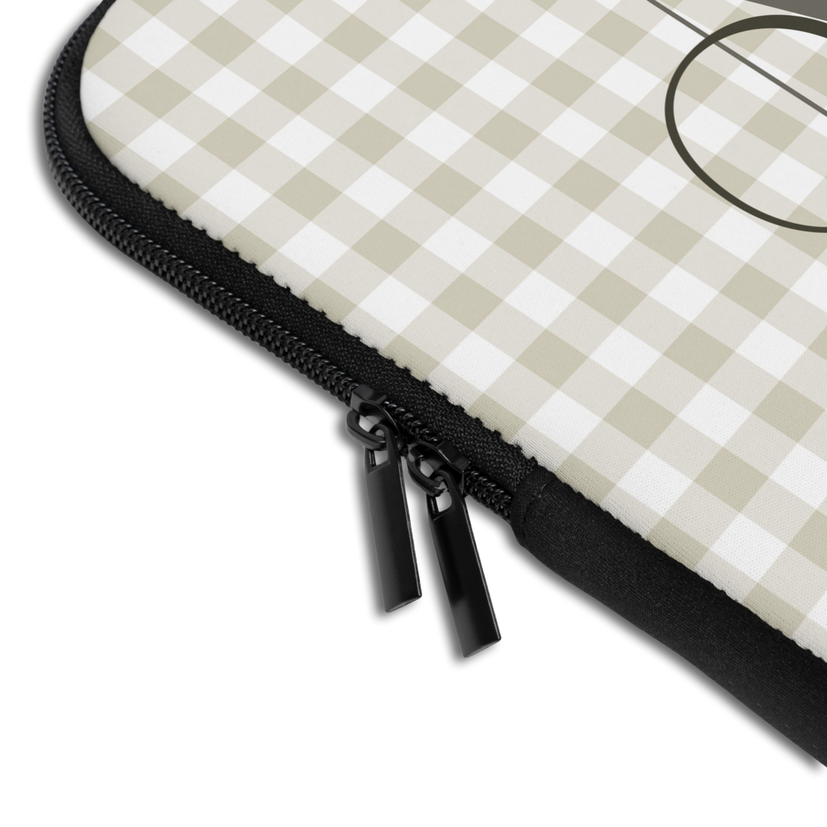 Close-up of the Personalized Gingham Name & Initials Laptop Sleeve sleeve corner showing the printed design, the padded edge and the dual zipper pulls