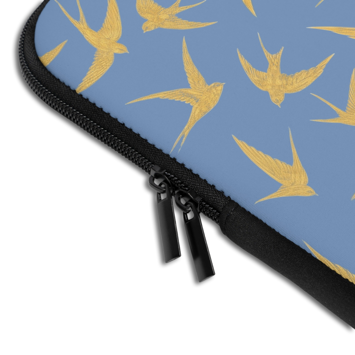 Close-up of the Personalized Golden Swallows Laptop Sleeve sleeve corner showing the printed design, the padded edge and the dual zipper pulls