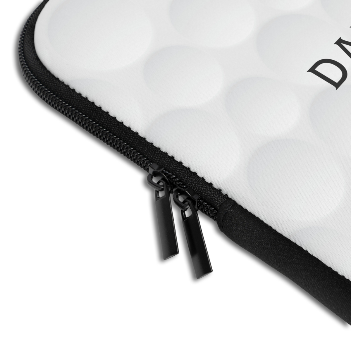 Close-up of the Personalized Golf Laptop Sleeve sleeve corner showing the printed design, the padded edge and the dual zipper pulls