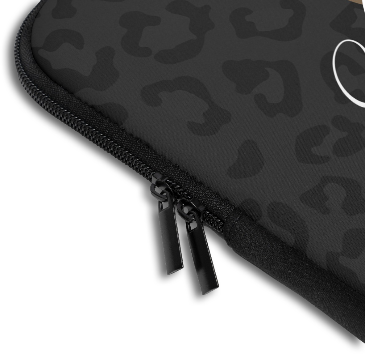 Close-up of the Dark Leopard Monogram Name Laptop Sleeve sleeve corner showing the printed design, the padded edge and the dual zipper pulls