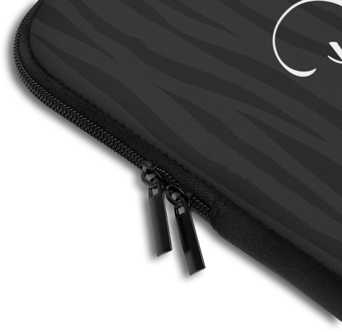 Close-up of the Dark Zebra Monogram Name Laptop Sleeve sleeve corner showing the printed design, the padded edge and the dual zipper pulls