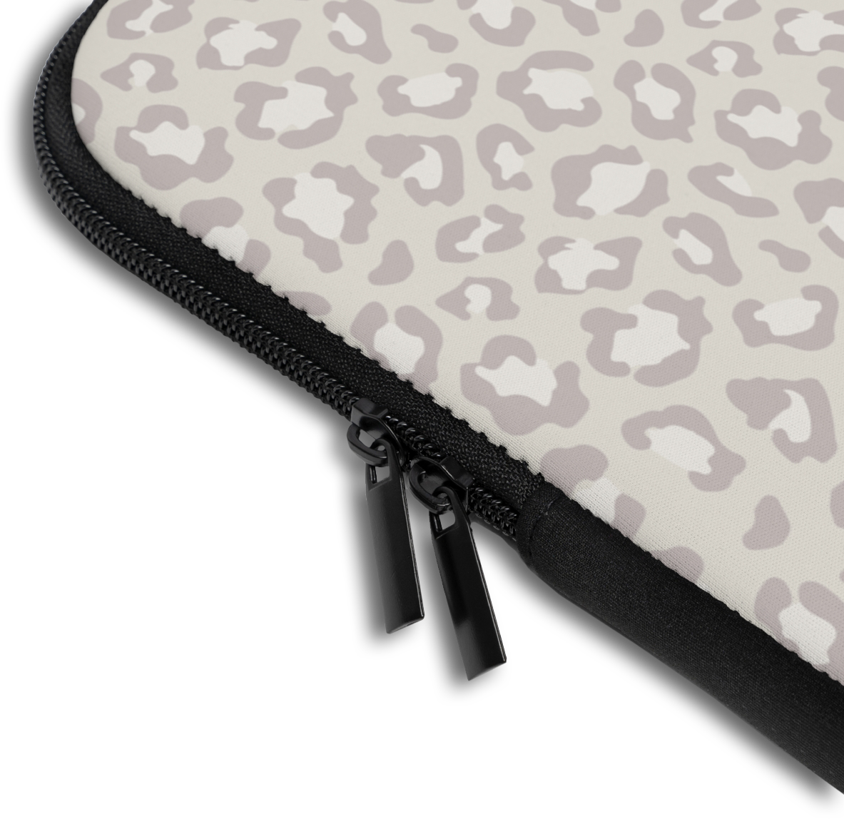Close-up of the Nude Leopard Custom Name Laptop Sleeve sleeve corner showing the printed design, the padded edge and the dual zipper pulls