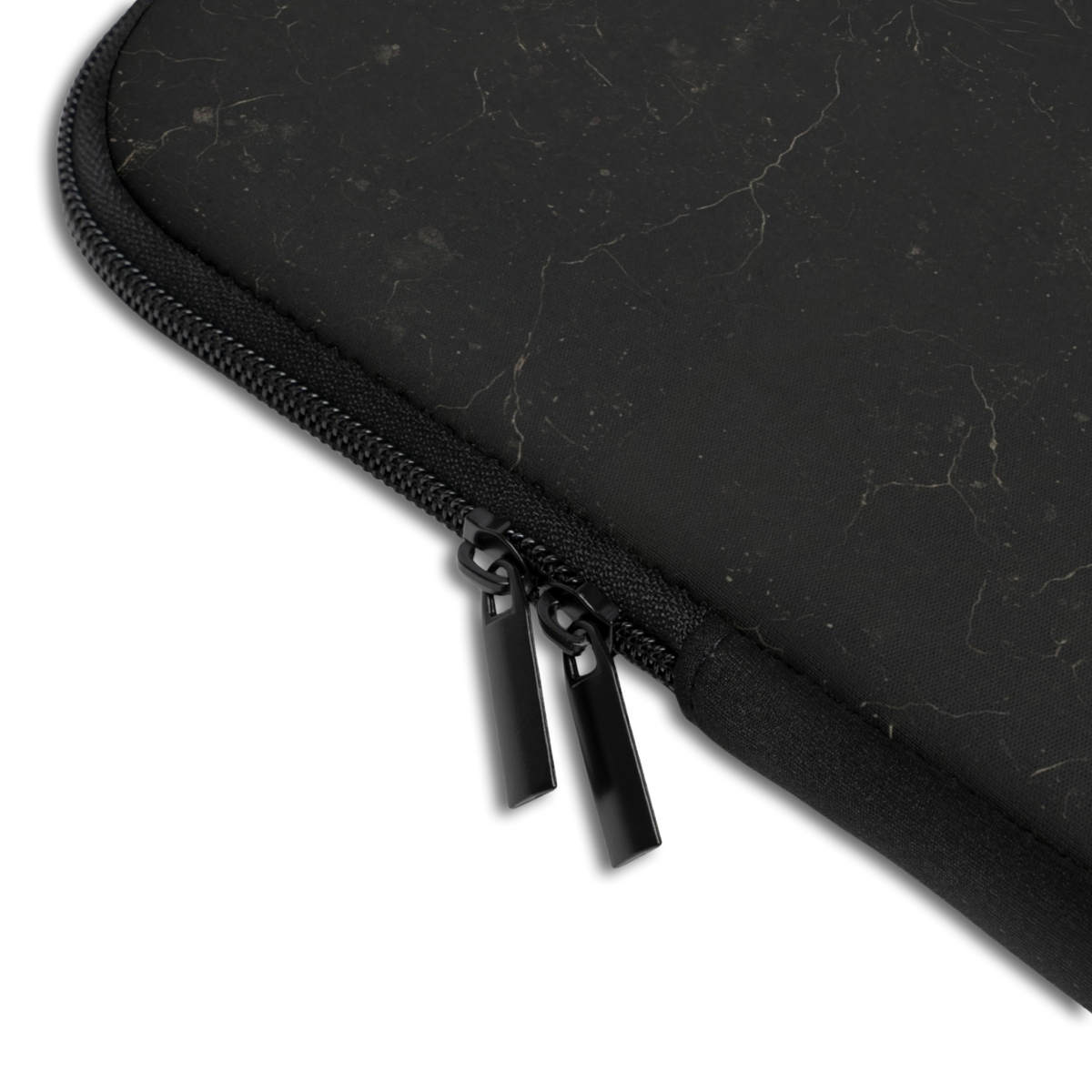 Close-up of the Personalized Obsidian Skull Laptop Sleeve sleeve corner showing the printed design, the padded edge and the dual zipper pulls