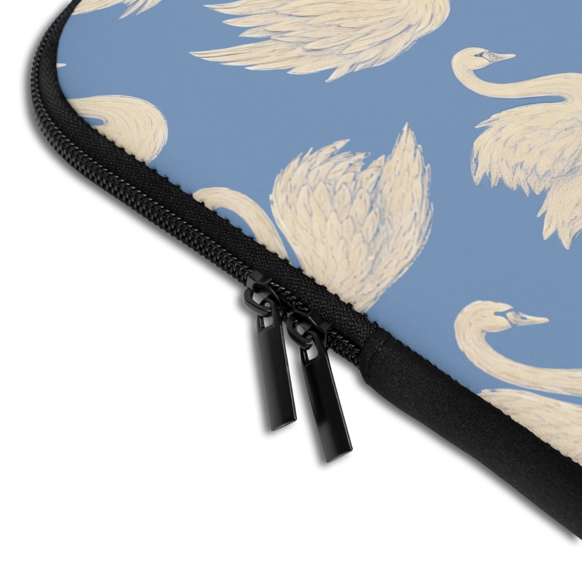 Close-up of the Personalized Swan Lake Laptop Sleeve sleeve corner showing the printed design, the padded edge and the dual zipper pulls