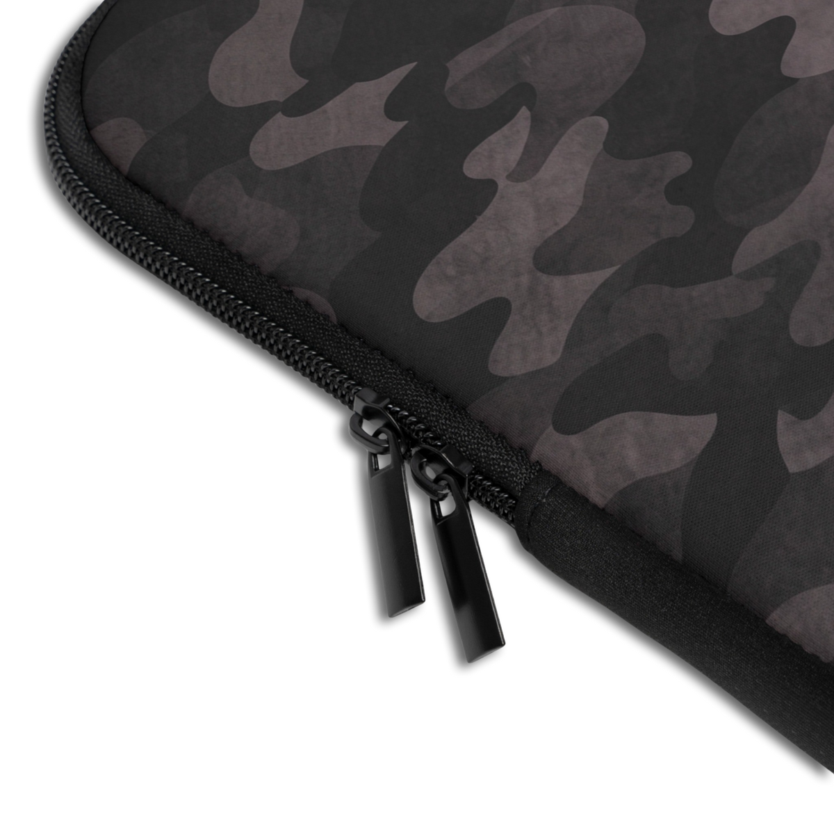 Close-up of the Personalized Tactical Camo Laptop Sleeve sleeve corner showing the printed design, the padded edge and the dual zipper pulls