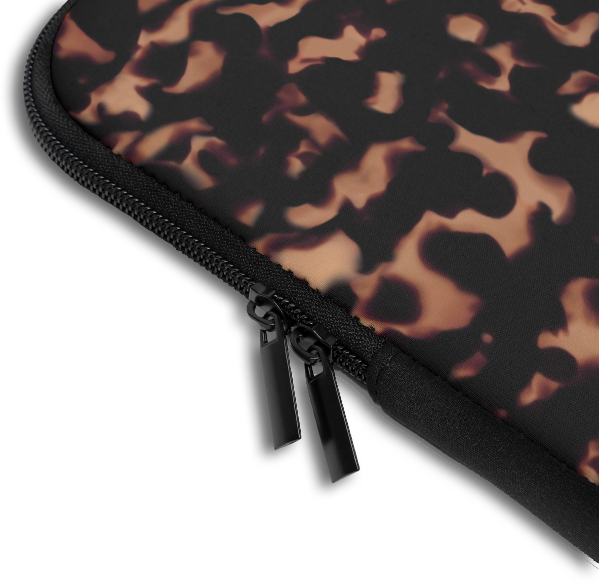 Close-up of the Tortoiseshell Custom Name Laptop Sleeve sleeve corner showing the printed design, the padded edge and the dual zipper pulls