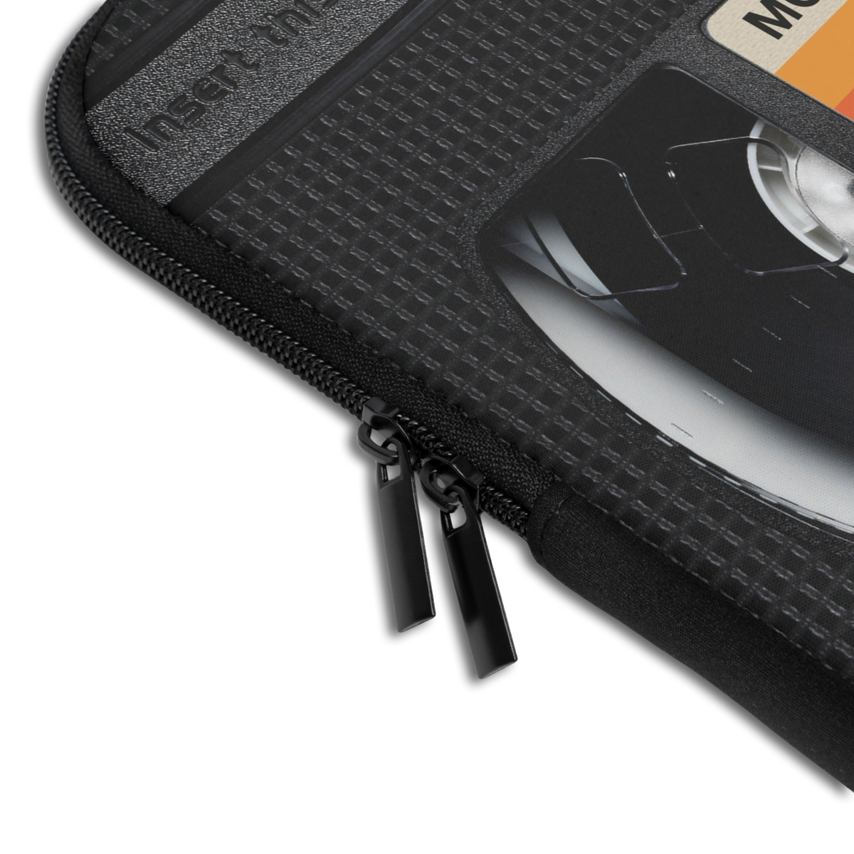 Close-up of the Personalized VHS Video Cassette Laptop Sleeve sleeve corner showing the printed design, the padded edge and the dual zipper pulls